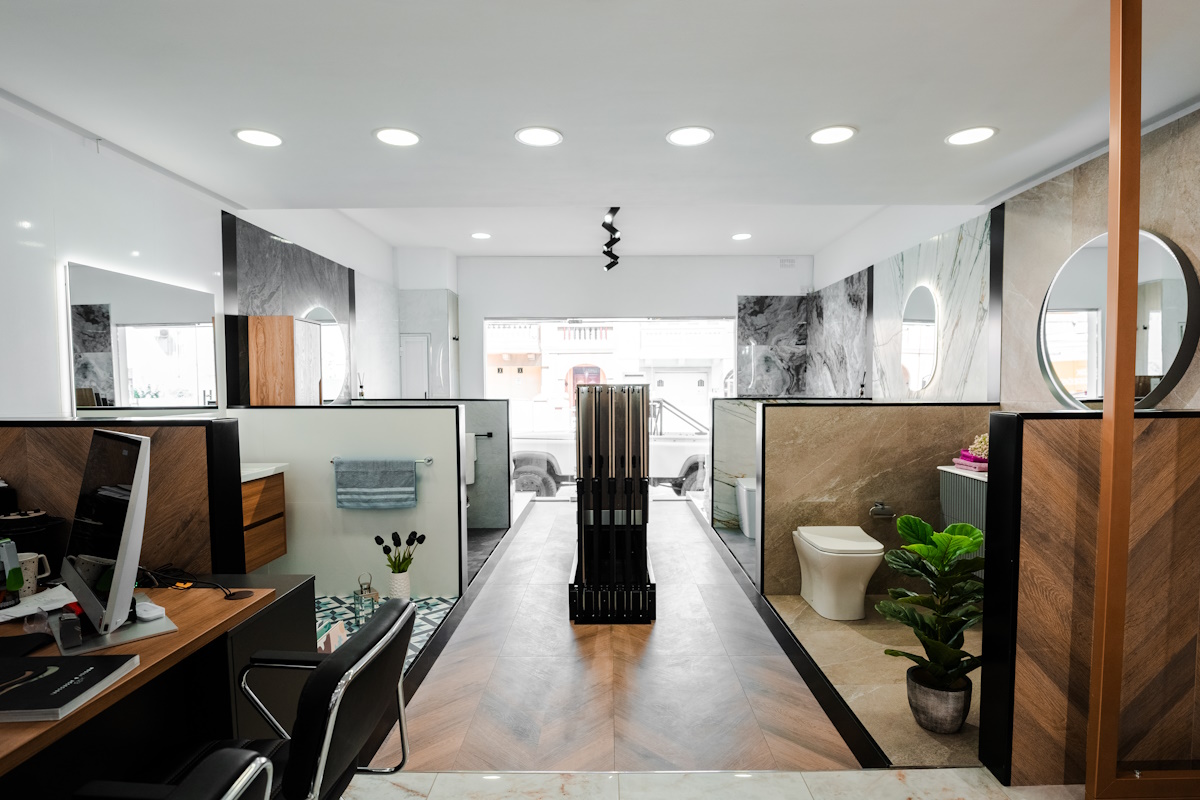 The TUB showroom aisle with bathroom displays and tile samples